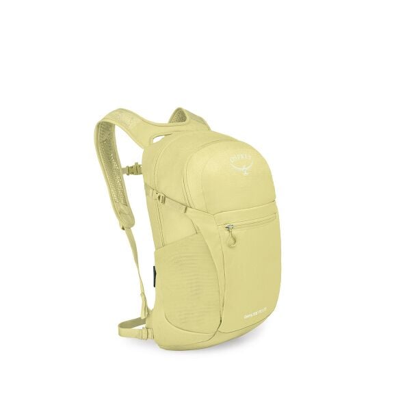 A green camouflage Osprey Daylite Plus backpack is shown from a front-left angle. It has two main zippered compartments, a small front zip pocket with a zipper pull, and a tan stretch side pocket. The shoulder straps are ventilated with mesh and there is 