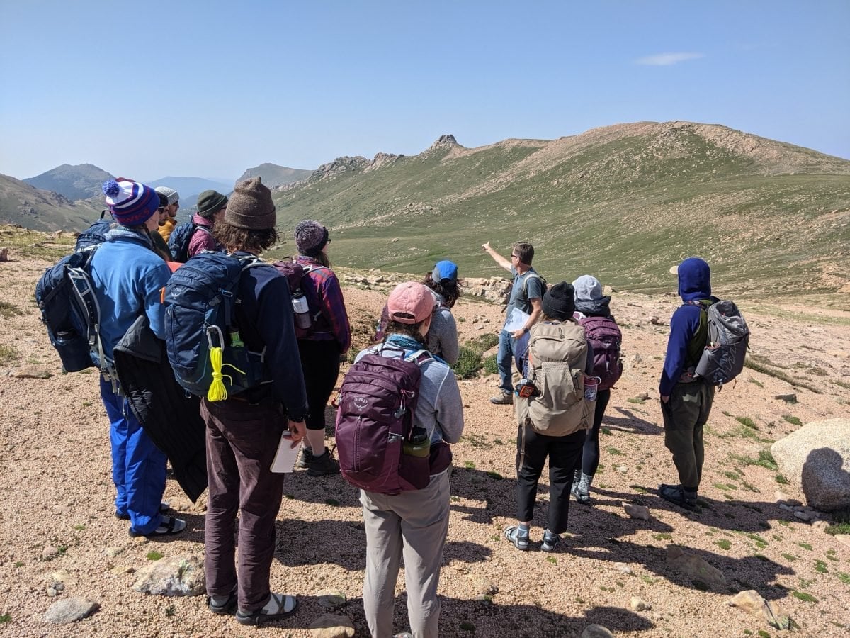 RMFI students atop a mountain during the 2021 Earth Corp field studies course.