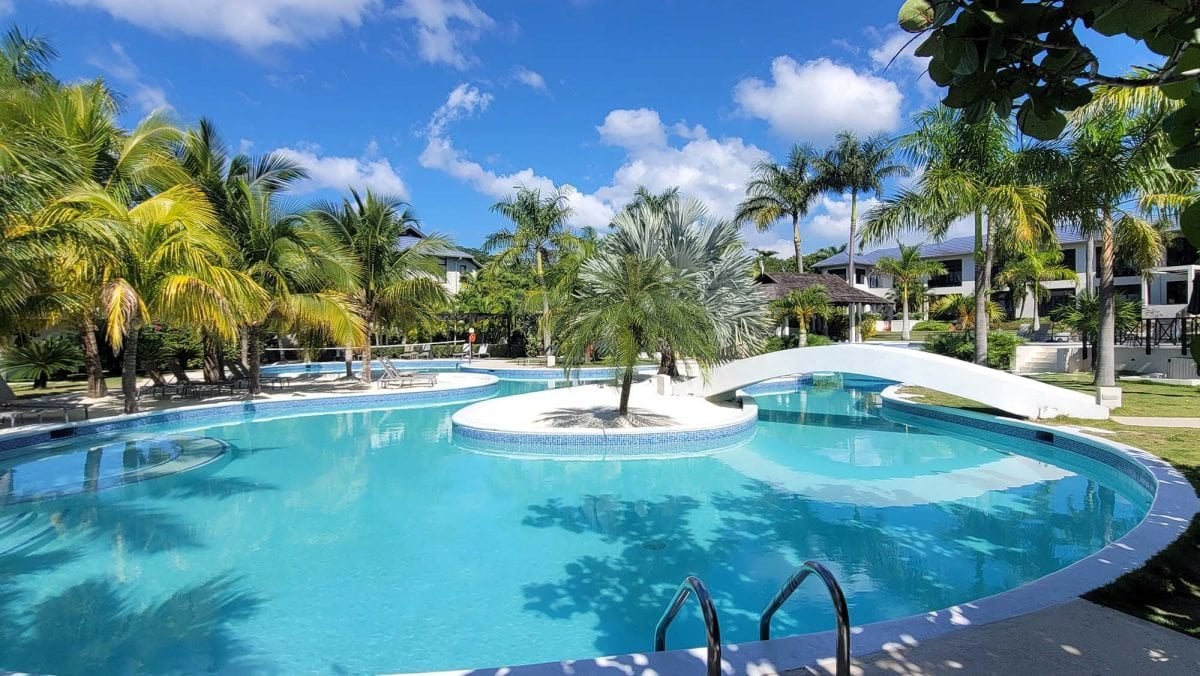 A sweeping view of a resort pool