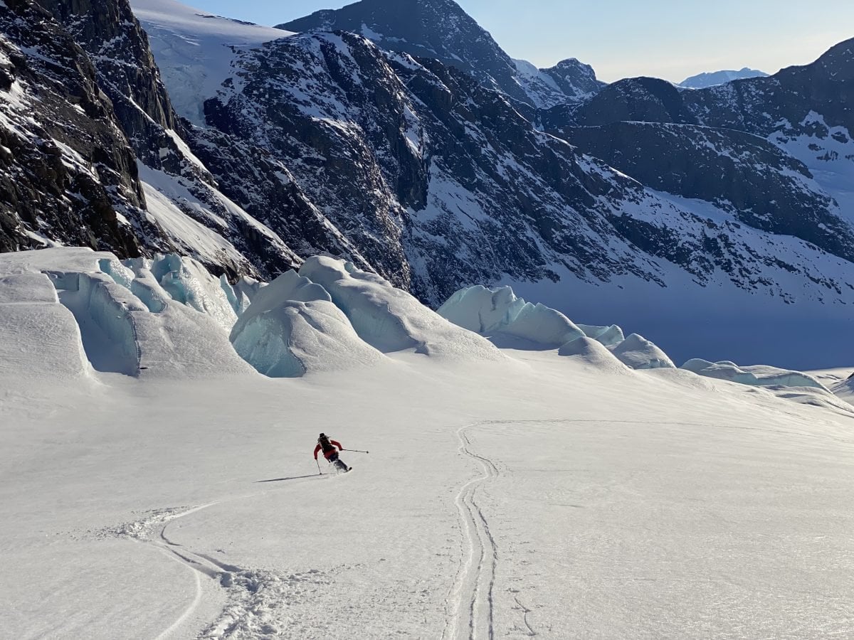 A person skiing down a mountain
