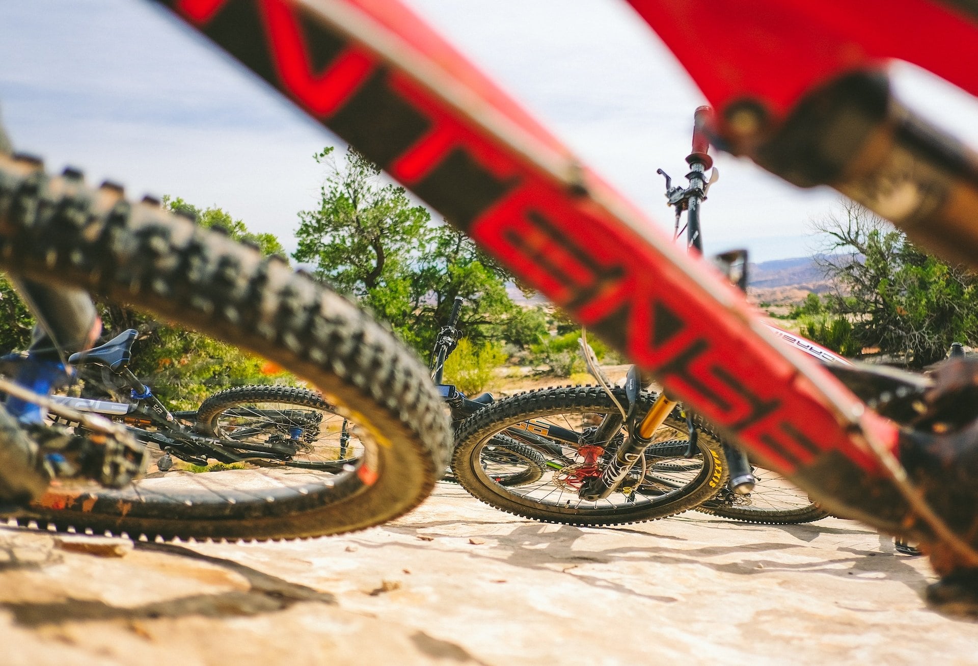 A group of bikes laying down on slickrock