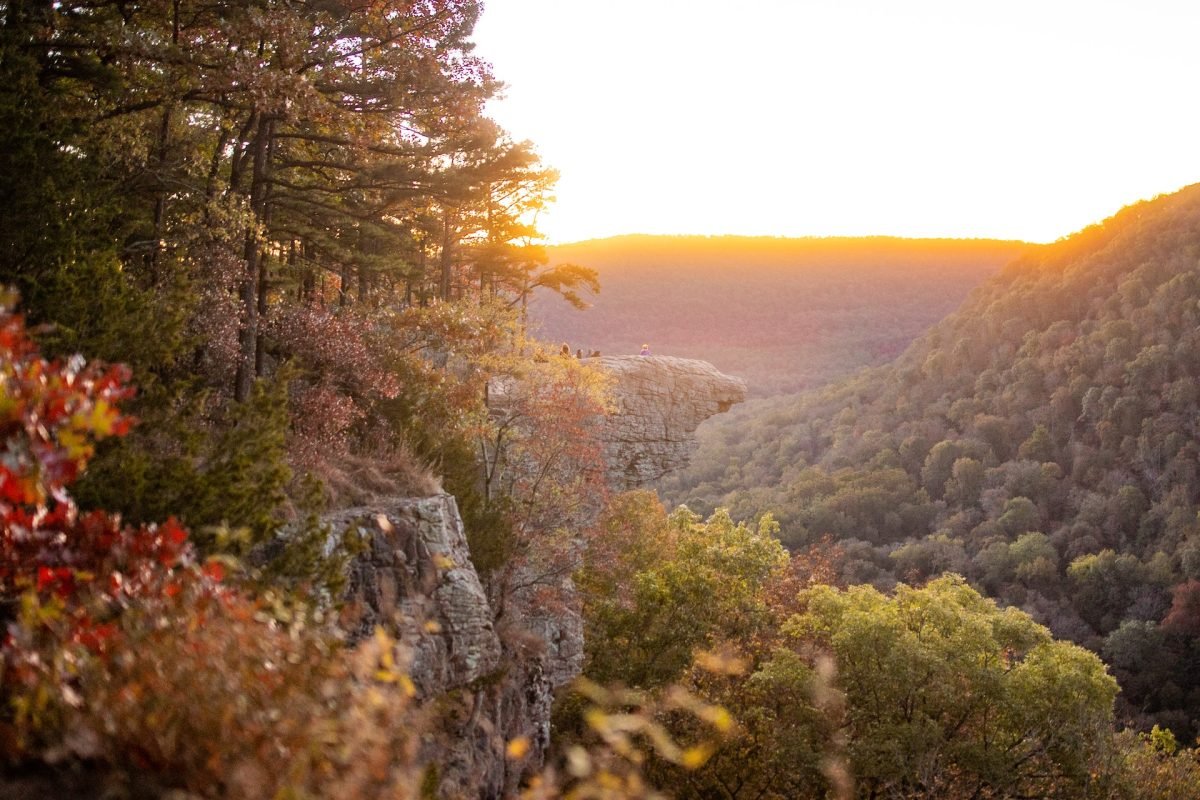 A landscape view of rock faces, with forests of tress all over