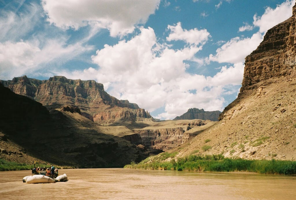 A raft floats down the Grand Canyon.